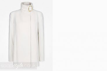 Nikki Spraggan in EastEnders cream funnel neck coat