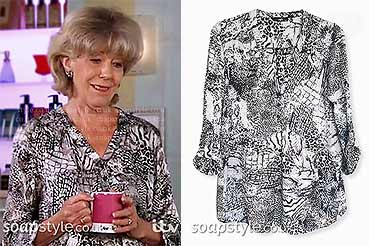 Audrey Roberts (Sue Nicholls) black and white mixed print blouse in the ITV soap Coronation Street