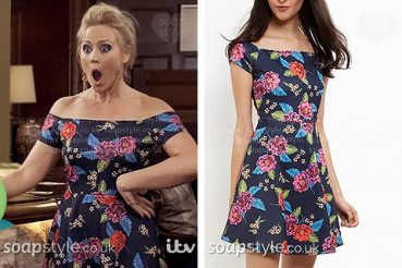 Picture of Tracy wearing a floral skater dress with bardot neckline in the ITV soap Emmerdale