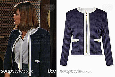 Chrissie white and navy blue jacket in Emmerdale