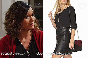 Chas’ Black & Gold Zip Neck Top in Emmerdale