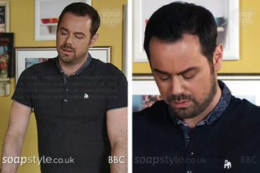 Mick Carter (Danny Dyer) wearing a blue top with white bulldog on TV in EastEnders