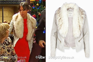 Priya wearing a grey faux fur collar jacket in Emmerdale tonight