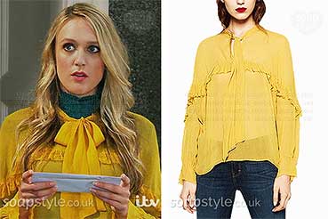 Rebecca in Emmerdale yellow blouse